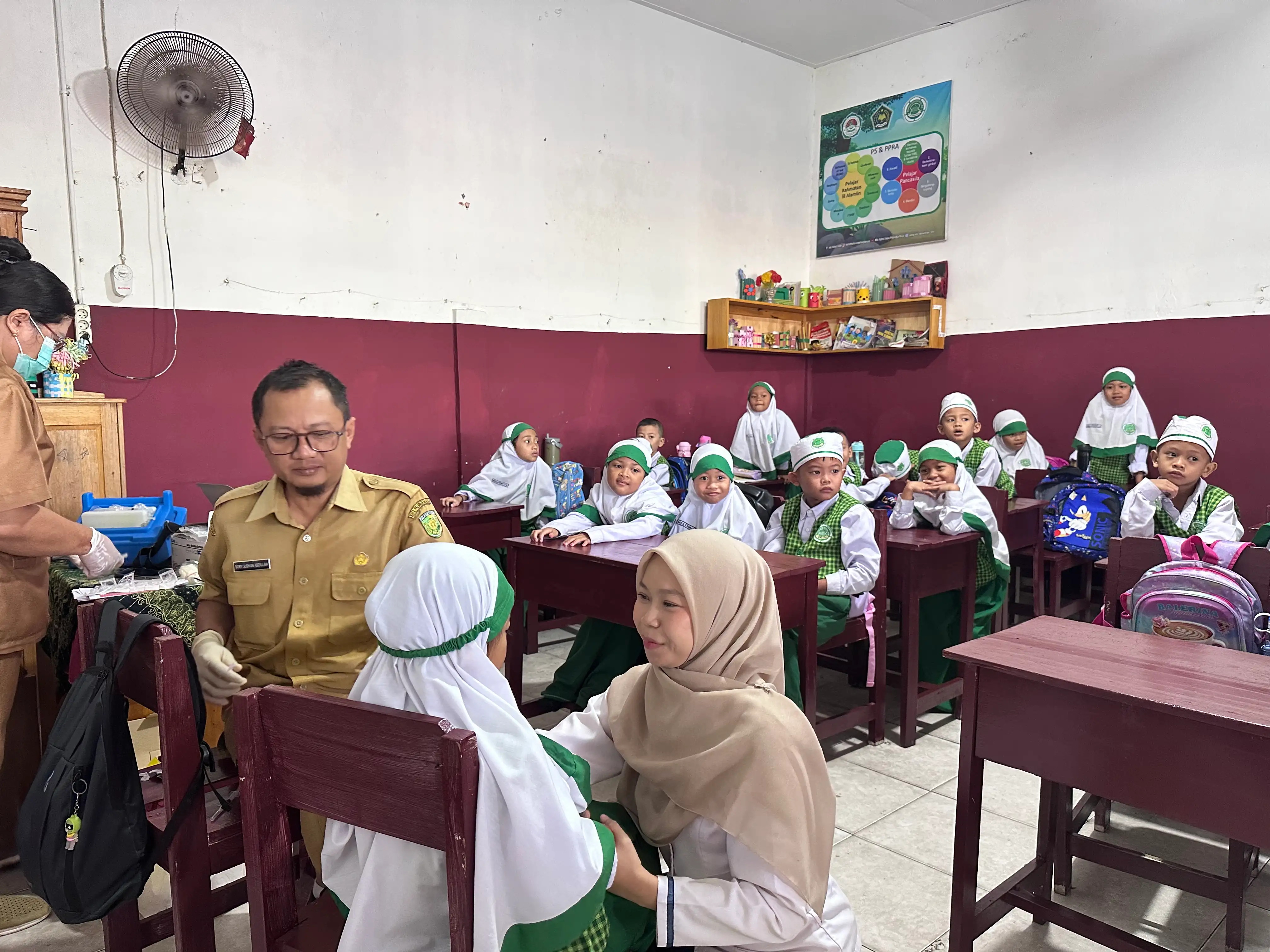 Proses Suntik Imunisasi